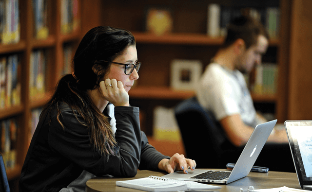 student studying library